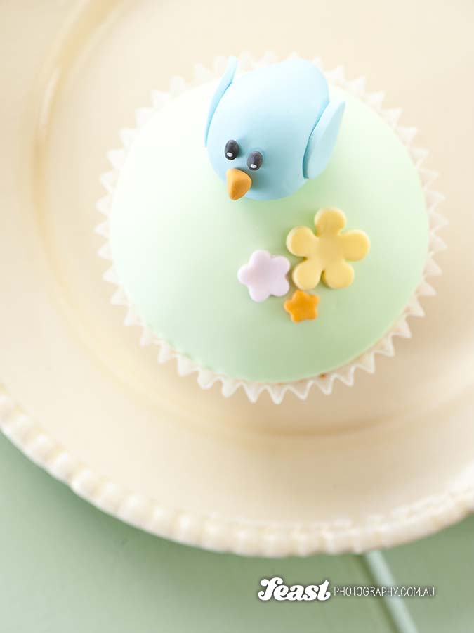 Bluebird in a meadow cupcake